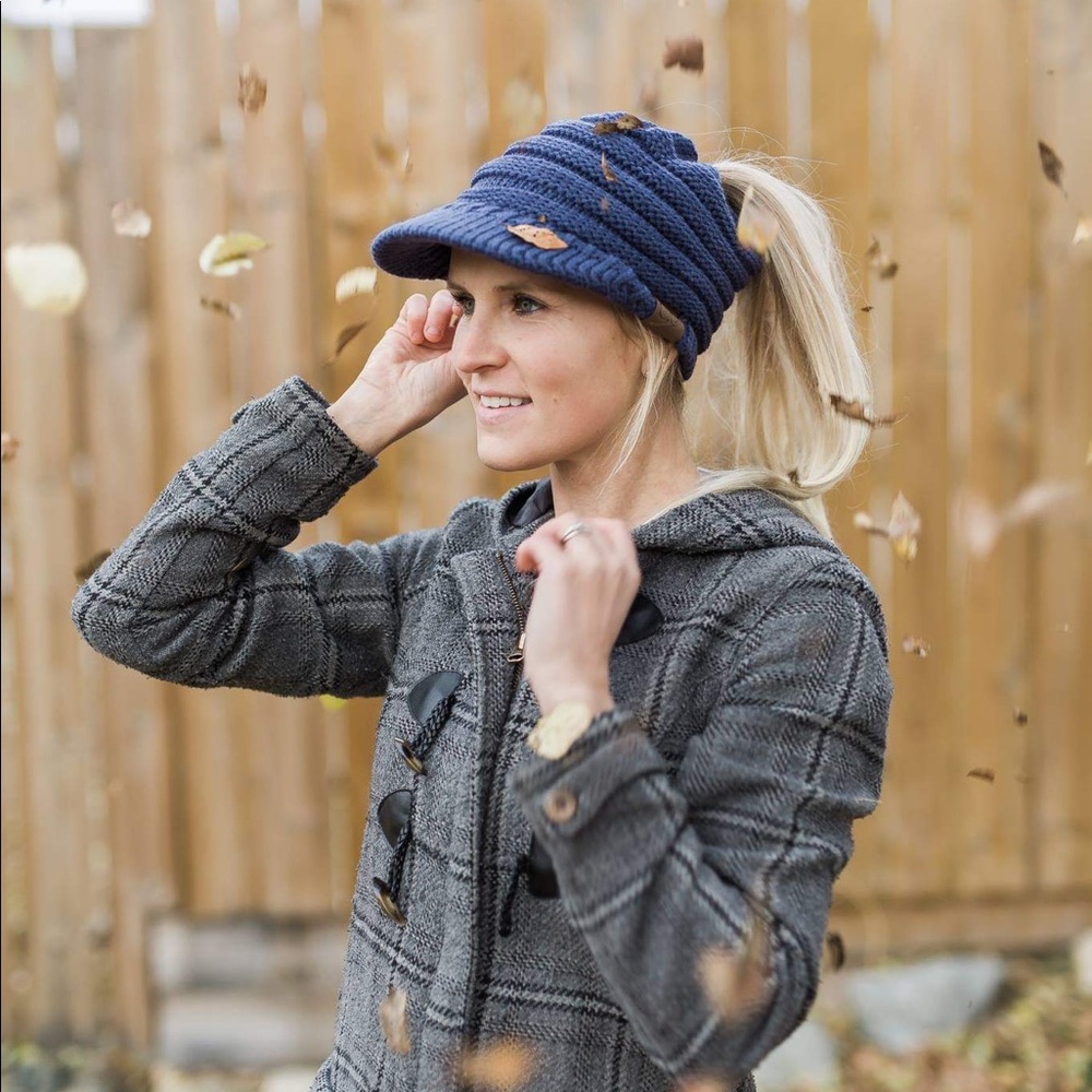 C.C pony tail toque with brim navy blue